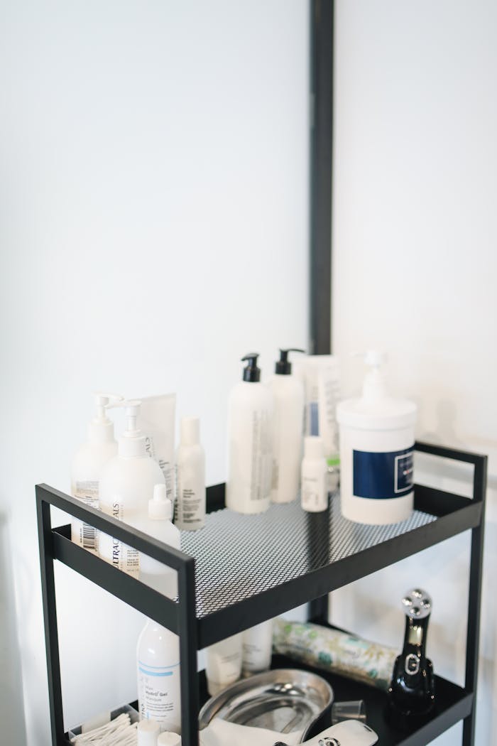 Organized beauty products on a salon cart with a clean, minimalist look.